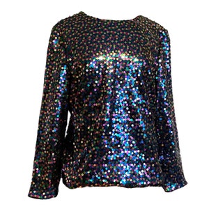May include: A long-sleeved iridescent sequined top with a round neckline. The sequins are in shades of blue, green, pink, and gold.