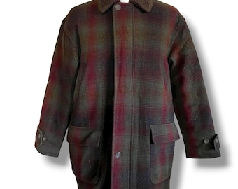 May include: A plaid coat in shades of green, burgundy, and brown. The coat features a brown, fuzzy collar, two front pockets, and button closures. The sleeves have buttoned cuffs.