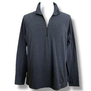 May include: A dark grey long-sleeved shirt with a quarter-zip closure. The shirt has a heather pattern and a small logo on the bottom right.