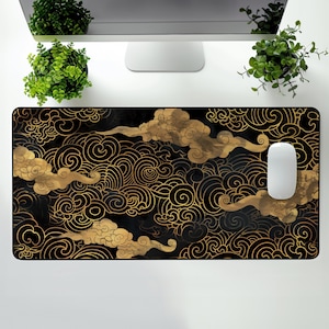 May include: Black and gold mouse pad with a repeating pattern of stylized clouds. The clouds are outlined in gold and filled with a black and gold gradient.