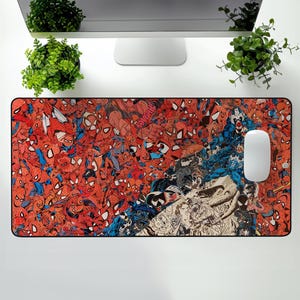 May include: A red and blue comic book style mouse pad featuring a collage of Spider-Man characters. The mouse pad is rectangular and has a black border.