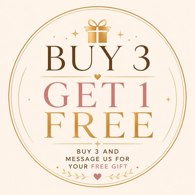 May include: A circular graphic with a cream background and gold border featuring the text BUY 3 GET 1 FREE in dark brown and muted pink. A gold gift icon sits at the top, with smaller text below reading BUY 3 AND MESSAGE US FOR YOUR FREE GIFT.