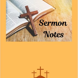 May include: A wooden cross rests on an open book with the words "Sermon Notes" in black script. The background is a wooden surface with a warm, golden glow. The image also features three crosses on a hill.