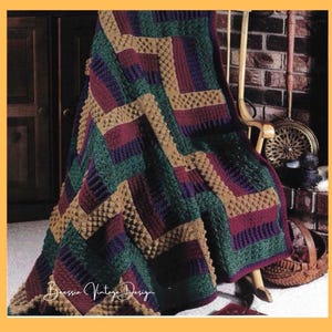 May include: A white ceramic mug with a black handle and the text "But First, Coffee" in a handwritten style. The mug is on a white surface. The mug is approximately 4 inches tall.