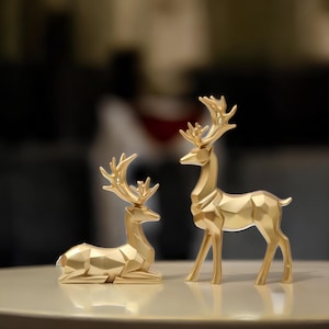 Set di statuette di cervi dorati, scultura geometrica moderna, arredamento di lusso per la casa e l'ufficio, design minimalista ed elegante, regalo perfetto per le feste e le occasioni speciali