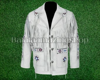 May include: White leather jacket with fringe detailing and beaded accents. The jacket has a button closure and long sleeves.