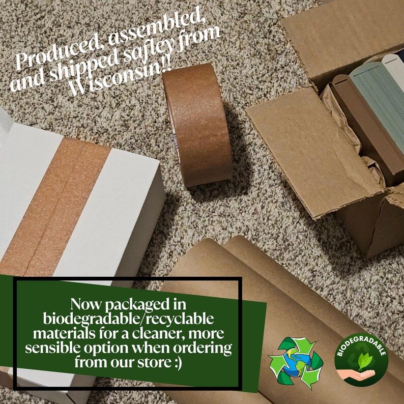 May include: An overhead shot shows packaging materials, including a roll of brown tape, cardboard boxes, and brown paper. Text reads "Produced, assembled, and shipped safely from Wisconsin!!" and "Now packaged in biodegradable/recyclable materials."