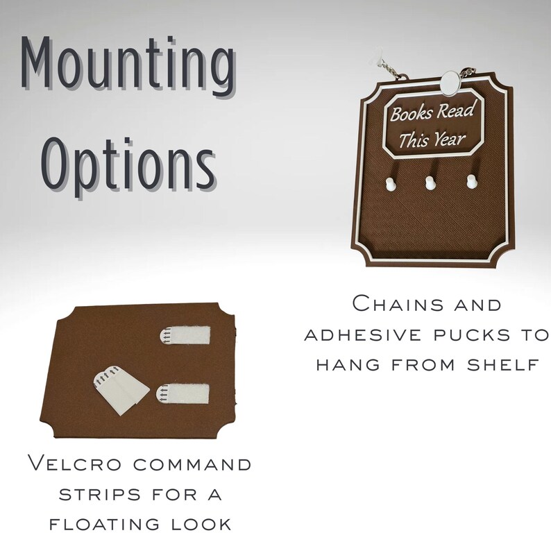 May include: A brown wooden sign with the text "Books Read This Year" and three pegs. The image also shows mounting options: Velcro command strips and chains with adhesive pucks.