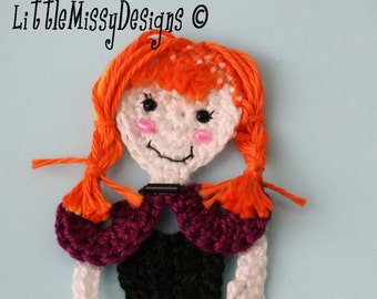 May include: Crochet pattern for a doll with orange hair, a purple bodice, a black top, a yellow belt, and a blue skirt. The pattern is available as a PDF download. The text "PDF PATTERN" is visible in the image.