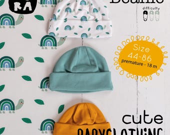 May include: Three baby beanies in white, teal, and mustard yellow. The white beanie has a turtle and rainbow pattern. The teal and mustard beanies are solid colors. Text on the image says "Beanie", "Size 44-86", and "cute BABYCLOTHING".