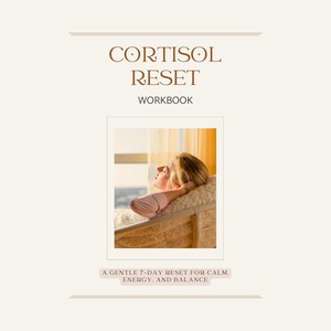 May include: A workbook titled "Cortisol Reset" with a woman relaxing in a chair. The cover features text in brown and a beige background. The text "A gentle 7-day reset for calm, energy, and balance" is also included.