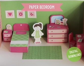 May include: A papercraft dollhouse bedroom with a pink bed, green rug, dresser, desk, and chair. The bedroom has a green wall with pink and green decorations. The text "PAPER BEDROOM" is at the top of the image. The text "DIGITAL DOWNLOAD" is at the bottom of the image.