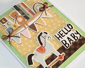 Handmade Baby Boy or Girl Congratulations Card - BoHo Theme Features a Book Shelf with Blocks & Books, a Horse on Wheels - Hello Baby Phrase