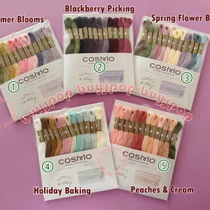 May include: Five packs of embroidery floss, each containing 12 skeins of thread. The packs are labeled with the names "Summer Blooms", "Blackberry Picking", "Spring Flower Basket", "Holiday Baking", and "Peaches & Cream".