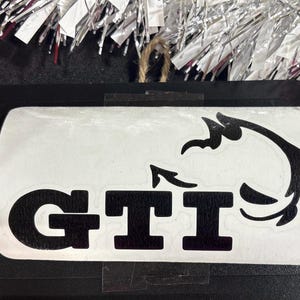 GTI Devil Decal Vinyl Sticker Car Decoration Exterior Accessory Automotive Design Emblem Badge Matte Finish Glossy Option Custom Color Selection Weather Resistant Material Vehicle Enhancement Performance Style Personalization Volkswagen