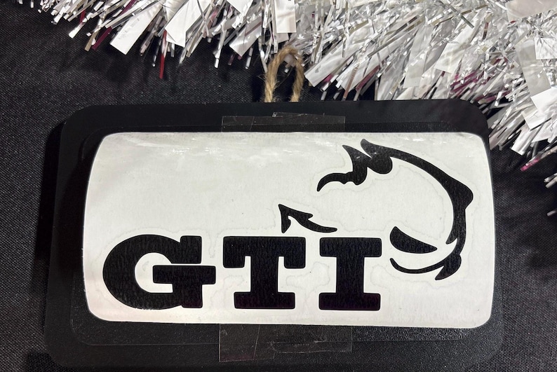 GTI Devil Decal Vinyl Sticker Car Decoration Exterior Accessory Automotive Design Emblem Badge Matte Finish Glossy Option Custom Color Selection Weather Resistant Material Vehicle Enhancement Performance Style Personalization Volkswagen