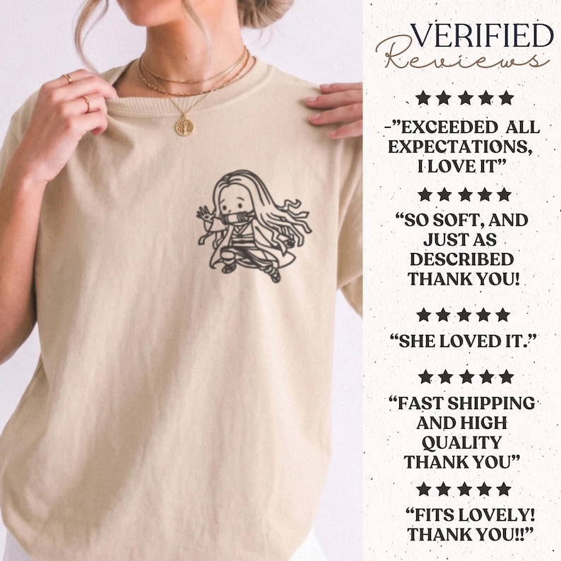 May include: A beige short-sleeved t-shirt featuring a black line art graphic of a long-haired anime character on the left chest. The image includes text reviews with five-star ratings stating: EXCEEDED ALL EXPECTATIONS, SO SOFT, SHE LOVED IT.