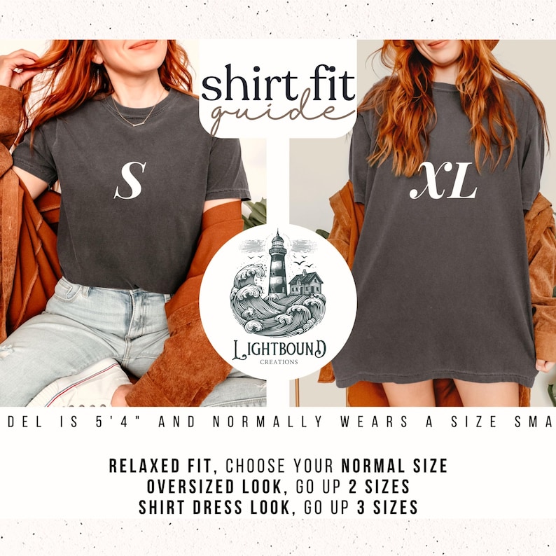 May include: Two charcoal gray t-shirts, one labeled "S" and the other "XL", are displayed. The image includes a "shirt fit guide" with sizing recommendations. A circular logo features a lighthouse scene. The text advises choosing normal size for relaxed fit, going up two sizes for an oversized look, and three sizes for a shirt dress look.