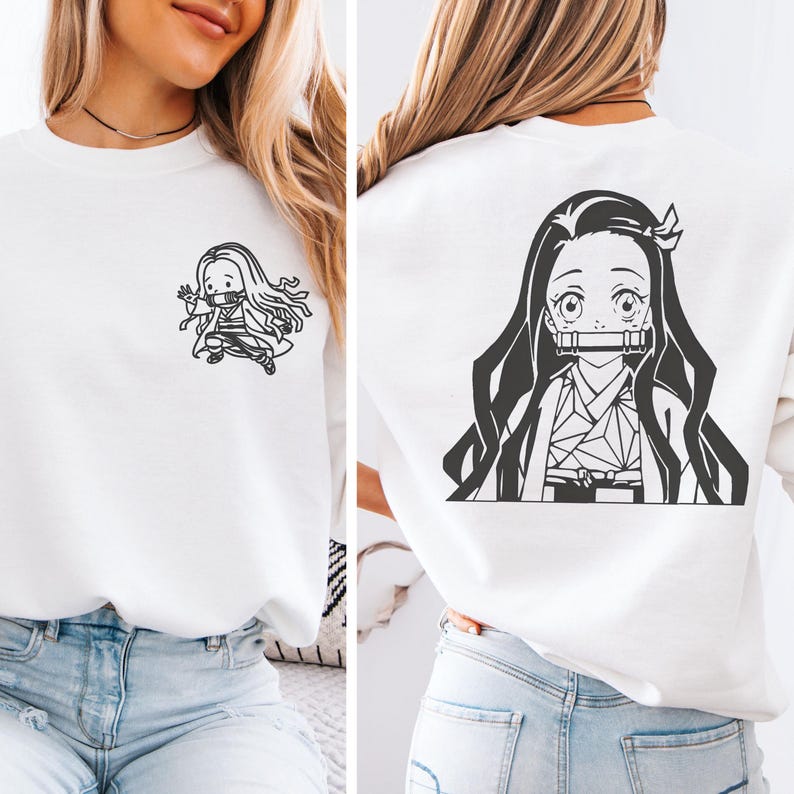 May include: A white crewneck sweatshirt featuring a small black graphic of a long-haired anime character on the front left chest and a large black graphic of the same character on the back, both depicting a figure with a bamboo muzzle.