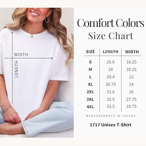 May include: A Comfort Colors size chart for a 1717 unisex t-shirt. The chart lists sizes S through 4XL with corresponding length and width measurements in inches. A white t-shirt is shown with dashed lines indicating how to measure length and width.