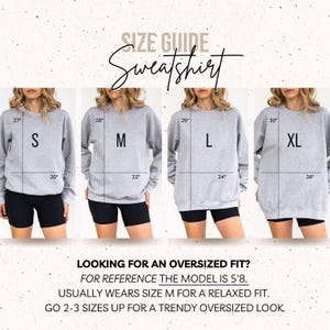 May include: A size guide for a grey sweatshirt showing four sizes from S to XL. Each sweatshirt displays measurements in inches for length and width. Text includes 'SIZE GUIDE', 'Sweatshirt', and notes on fit for a model who is 5'8.