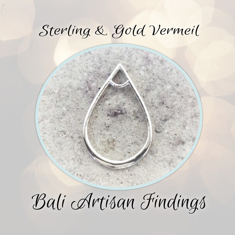 May include: A silver-colored teardrop-shaped jewelry finding. The open-backed pendant has a loop at the top and a rounded bottom. The text "Sterling & Gold Vermeil" and "Bali Artisan Findings" are also in the image.