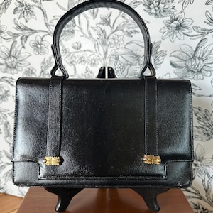 Bolso Hilco vintage de cuero negro con asa superior y detalles dorados, 22,7 x 15,2 cm, hecho en Haití, pequeño bolso de mano, década de 1960