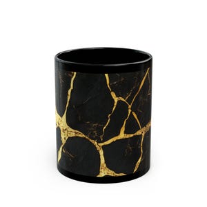 Kintsugi style design in black with gold (cup3). Printed on Black mug 11oz