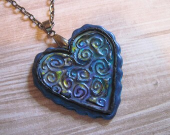 Moody blue swirl heart pendant| Contemporary style in a classic shape| Handcrafted from polymer clay| Perfect gift pre-wrapped in FREE pouch