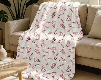 Manta de felpa de terciopelo con estampado de bastones de caramelo navideños / Manta navideña