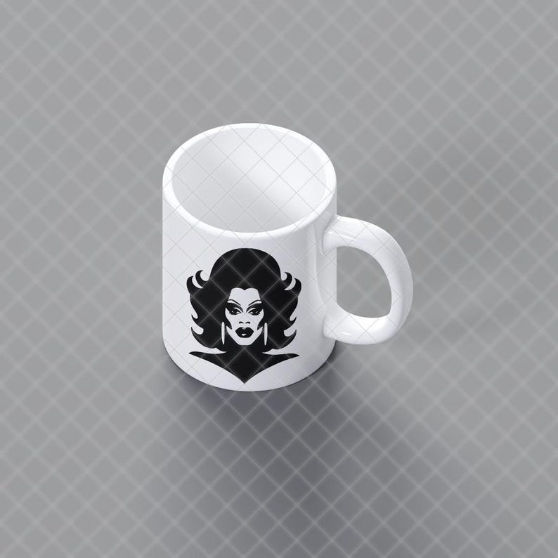 May include: A white ceramic mug featuring a black graphic illustration of a person with voluminous hair, dramatic makeup, and long earrings. The mug has a standard cylindrical shape with a curved handle on the right side, presented from an angle. This image is part of the RuPaul Drag Race Clipart Bundle, Queen of Drag SVG PNG JPG digital download.