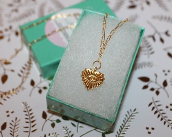 18k gold plated vermeil Spikey Heart Evil Eye necklace symbolizes love, luck, and protection.