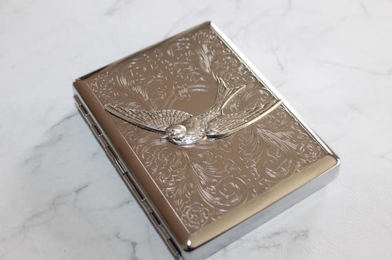 Victorian style wallet, business card, ladies golf tee or cigarette case with a graceful swallow bird – a symbol of hope and safe return