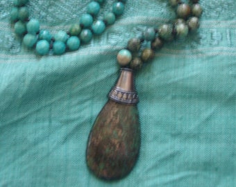 African turquoise mala with faceted turquoise howlite and African turquoise pendant