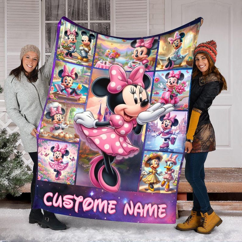 May include: A large, rectangular blanket featuring a collage of Minnie Mouse images in various poses, with a central image of Minnie in a pink polka-dot dress. The blanket has a purple border and includes the text "CUSTOM NAME" at the bottom.