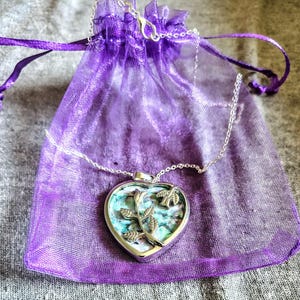Mother of pearl necklace Heart pendant Sterling silver ocean inspired jewelry Nature inspired gift for her Iridescent shell pendant