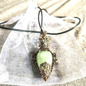 Green adventuring luck and opportunity pendant necklace Ornate filigree design Witchy spiritual jewelry Unique crystal gift Crystal pendulum