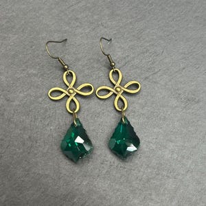 bronze Celtic ribbon knot with emerald green crystal dangle earring - Irish lucky