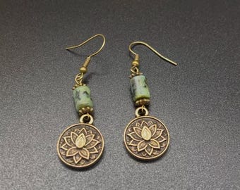 bronze lotus pendant dangle earrings with African turquoise bead on bronze ear hooks, great for a yogi or spiritual person