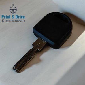 May include: A black plastic key cover with a silver key. The key cover has a small hole on the top and the text "Whalen" is printed on the side of the key.