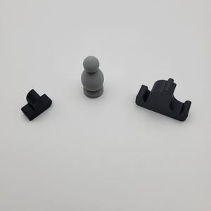 Catan Robber, Seafarers Pirate Boat, and CnKs Barbarian Ship