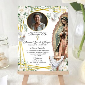 May include: A memorial card featuring a portrait of a woman, white roses, and gold detailing. The card has Spanish text, including the name "Antonia Rios de Marquez" and details of a memorial service. An illustration of the Virgin Mary is also present.
