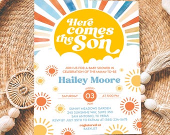 May include: Baby shower invitation with a retro sun design. The invitation features the text "Here comes the Son" in a yellow sunburst, with details for Hailey Moore's baby shower, including the date, time, and location.