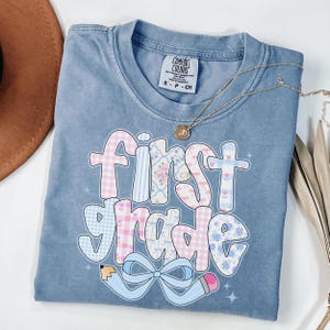 Comfort Colors® First Grade Teacher Shirt, Back to School 1st Grade Tee, Teacher Appreciation Gift, Cute Elementary School, Coquette Bow