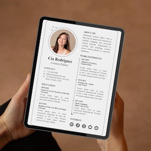 May include: A digital tablet displaying a resume. The resume includes a photo, contact information, education, work experience, and interests. The text on the resume reads "Cia Rodriguez, Content Editor."