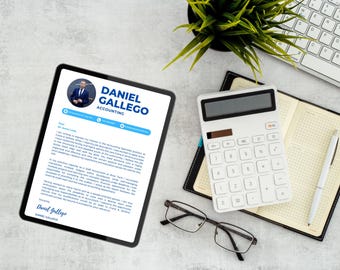 May include: A tablet displaying a resume with the name "Daniel Gallego" and the title "Accounting." A calculator, glasses, a pen, a notebook, a keyboard, and a small plant are also on the light gray surface.