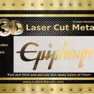 以下が含まれることがあります： エピフォンのロゴが刻まれた、金色の3Dレーザーカットメタル製デカール2枚。 デカールは厚さ0.1mmで、剥がして表面に貼り付けるように設計されています。 「Includes Two Decals」と「www.LuthierDecals.com」のテキストも表示されています。
