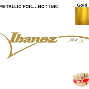 May include: Gold metallic foil decal of the Ibanez logo with the text "JEM J." underneath. The decal is 125 grams and comes with free shipping.