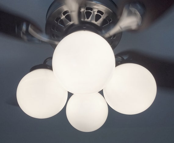 Bathroom light fixtures with fan deals