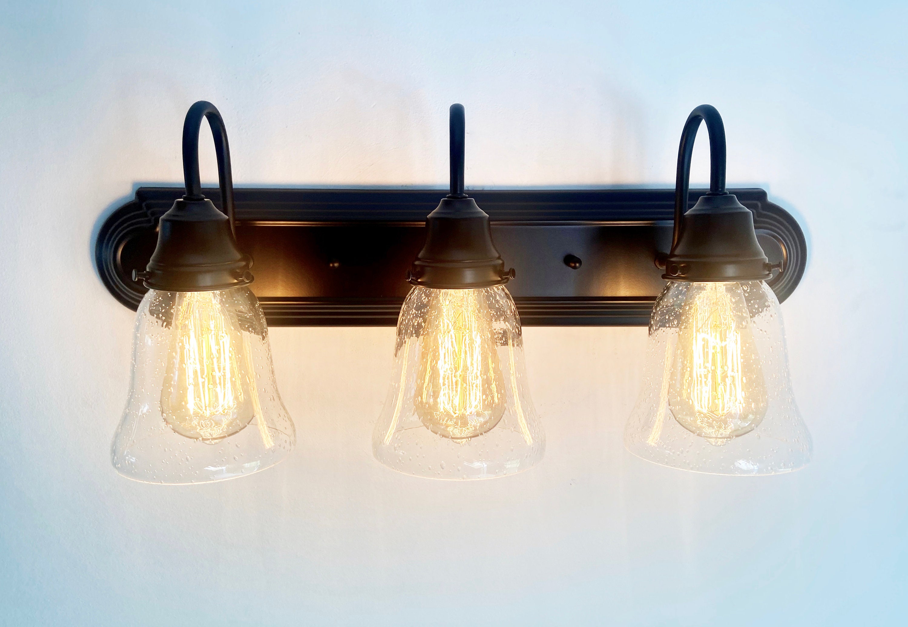 Seeded glass bathroom sale lighting